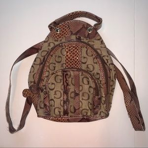 Guess mini snake skin patterned brand name logo backpack